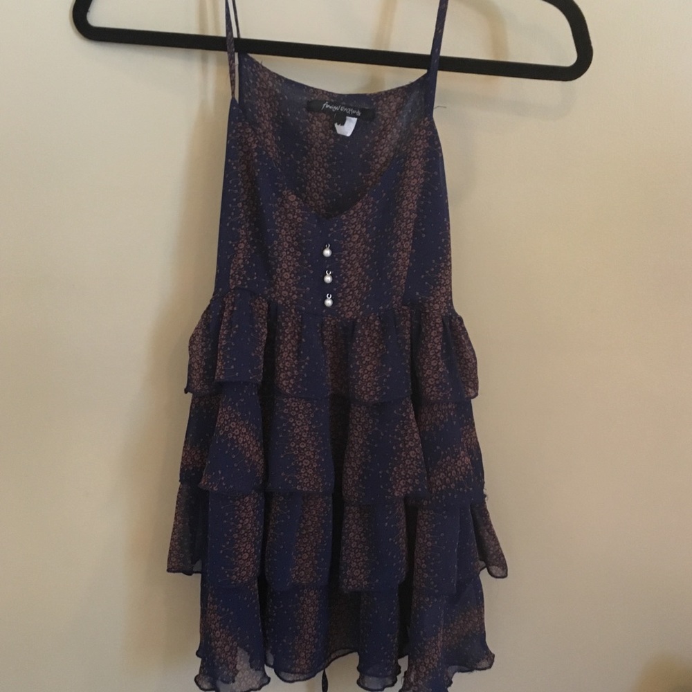 Sheer spaghetti top blouse.